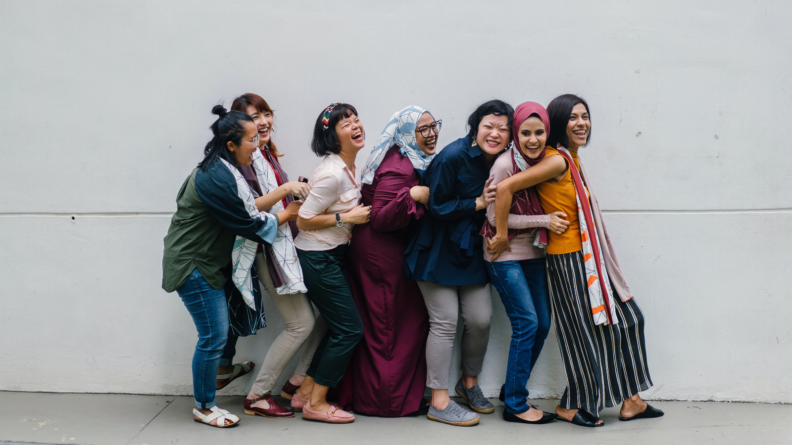 A group of woman supporting each other